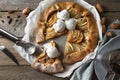 Delicious apple galette served with ice cream on wooden table, flat lay Royalty Free Stock Photo