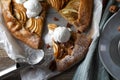 Delicious apple galette served with ice cream on wooden table, flat lay Royalty Free Stock Photo