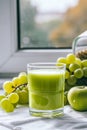 delicious apple grape smoothie on a white table Royalty Free Stock Photo