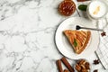 Delicious apple pie served on white marble table, flat lay. Space for text Royalty Free Stock Photo