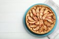 Delicious apple pie on white wooden table, top view. Space for text Royalty Free Stock Photo