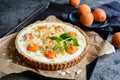 Apricot and cream cheese tart topped with almond flakes and crumble Royalty Free Stock Photo