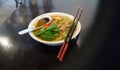 Delicious Asam Laksa with a red pair of chopsticks