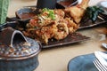 Delicious Asian Thai Dishes, Fried Soft Shell Crab with Salt and Pepper on Dark Ceramic Dinnerware Royalty Free Stock Photo