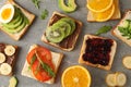 Delicious assorted sandwiches on background, top view