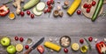 Delicious assortment of farm fresh vegetables with knife on grey wooden background , top view. Vegetarian ingredients for cooking. Royalty Free Stock Photo