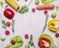 Delicious assortment of farm fresh vegetables lined frame on wooden rustic background top view close up place for text Royalty Free Stock Photo