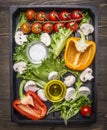 Delicious assortment of farm fresh vegetables wooden box wooden rustic background top view close up Royalty Free Stock Photo