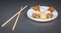 Delicious assortment of homemade Asian pastries. Samosas with a