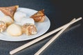 Delicious assortment of homemade Asian pastries. Samosas with a