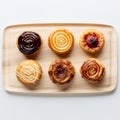 Delicious Assortment Of Pastries On Wooden Board