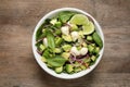 Delicious avocado salad with mozzarella on table, top view Royalty Free Stock Photo