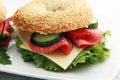 Delicious bagel sandwich on the table Royalty Free Stock Photo