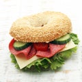 Delicious bagel sandwich on the table Royalty Free Stock Photo