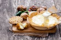 Delicious baked camembert with roasted potato and garlic Royalty Free Stock Photo