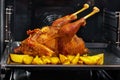 Delicious baked chicken in oven close-up Royalty Free Stock Photo