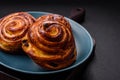 Delicious baked cinnamon raisin rolls in the form of rolls Royalty Free Stock Photo