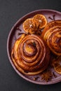 Delicious baked cinnamon raisin rolls in the form of rolls Royalty Free Stock Photo