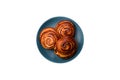 Delicious baked cinnamon raisin rolls in the form of rolls Royalty Free Stock Photo