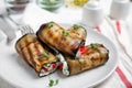 Delicious baked eggplant rolls served on table, closeup Royalty Free Stock Photo