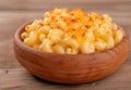 Delicious baked mac and cheese in a wooden bowl Royalty Free Stock Photo