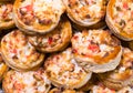 Delicious baked portioned tartlets made from puff pastry with cr Royalty Free Stock Photo