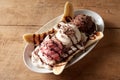 Delicious banana split dessert on wooden table Royalty Free Stock Photo