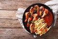 Delicious barbecue chicken wings with french fries and ketchup c Royalty Free Stock Photo
