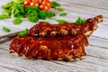 Delicious BBQ pork ribs with herbs and tangy BBQ sauce