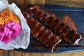 Delicious BBQ ribs, cole slaw and a tangy BBQ sauce Royalty Free Stock Photo