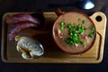 delicious bean broth with bacon, bread and pepper, typical Brazilian food