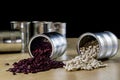 Delicious beans in a metal jar on a wooden kitchen table.