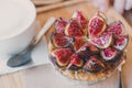 Delicious beautiful fig tartlet pastry. Fig fruit cut in half. Royalty Free Stock Photo