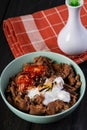 Beef bulgogi with kimchi and egg on rice Royalty Free Stock Photo