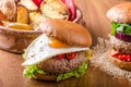 Delicious beef burger with egg Royalty Free Stock Photo