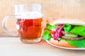 Delicious beef hamburger mug beer Royalty Free Stock Photo