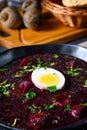 A Delicious beetroot borscht with egg Royalty Free Stock Photo