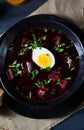 A Delicious beetroot borscht with egg Royalty Free Stock Photo