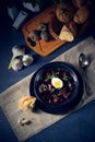 A Delicious beetroot borscht with egg Royalty Free Stock Photo
