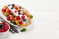 Delicious belgian waffles with summer berries