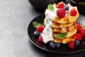 Delicious belgian waffles with summer berries