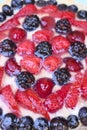 Delicious berry pie. Juicy blueberries, shiny red strawberries, tasty blackberries.