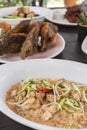 Delicious Bicol Express, Tilapia and other Filipino cuisine. Sumptuous lunch or buffet at an al fresco restaurant