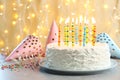 Delicious birthday cake with burning candles Royalty Free Stock Photo