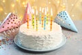 Delicious birthday cake with burning candles Royalty Free Stock Photo