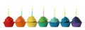 Delicious birthday cupcakes with candles isolated