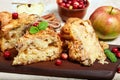 Delicious biscuit pie with apples, walnuts and cranberries Royalty Free Stock Photo