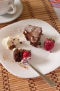 Delicious Bite of Chocolate Brownie and Strawberry with Whipped Royalty Free Stock Photo