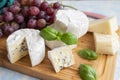 Delicious blue brie blue cheese with grapes