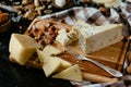 Delicious blue cheese on the board. Blue cheese Gorgonzola with nuts